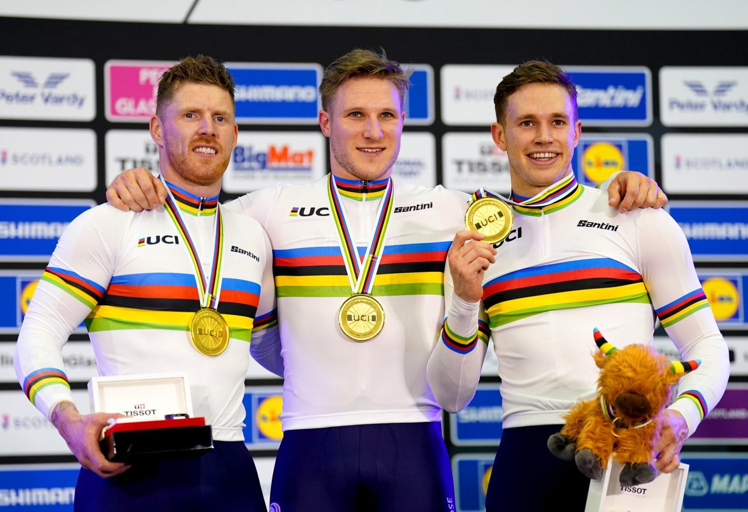 Netherlands' Roy van den Berg, Jeffrey Hoogland and Harrie Lavreysen celebrate on the podium after winning gold in the Men's Elite Team Sprint finals during day two of the 2023 UCI Cycling World Championships at the Sir Chris Hoy Velodrome, Glasgow. Picture date: Friday August 4, 2023.