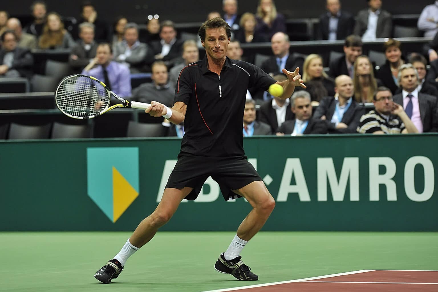 07-02-2011 TENNIS:ABNAMRO WTC:ROTTERDAM
ABN AMRO World Tennis Tournement
Mariusz Fyrstenberg POL en Marcin Matkowski POL winnen in twee sets van Jacco Eltingh NED en Paul Haarhuis NED
Paul HaarhuisFoto: Henk Seppen
