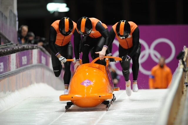 Edwin van Calker bobsledding at the Olympics.